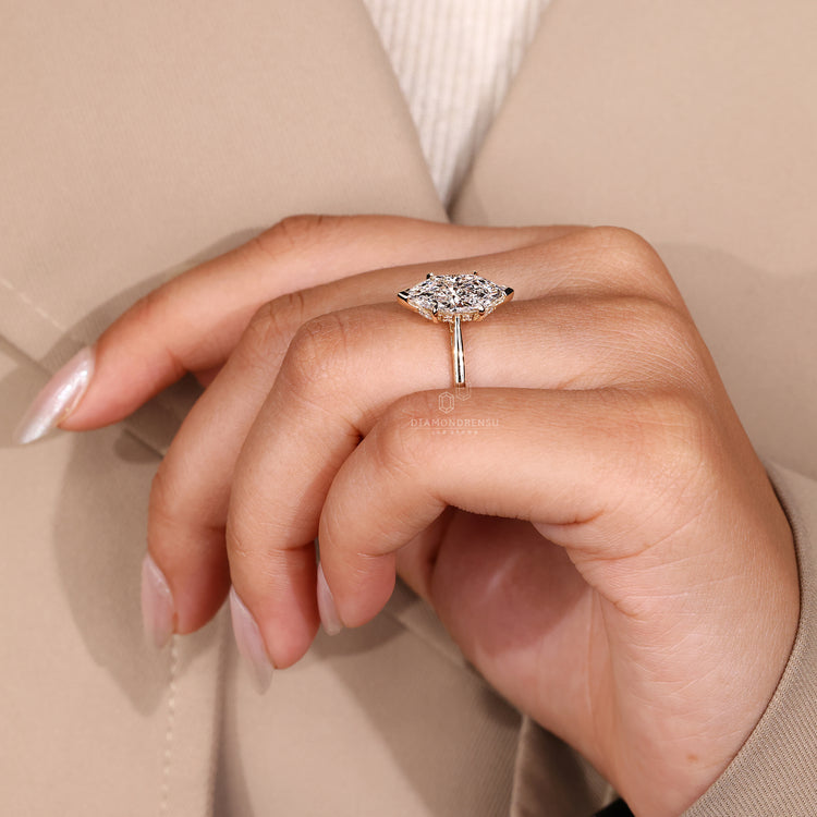 Yellow Gold Ring featuring solitaire and cathedral setting.