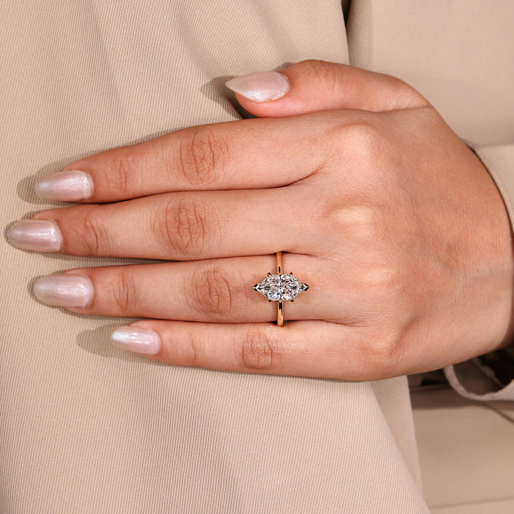 Custom Engagement Ring with Dutch marquise diamond center.