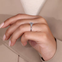 Round cut side stone fits white gold diamond ring.