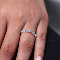 Round diamond half eternity band.