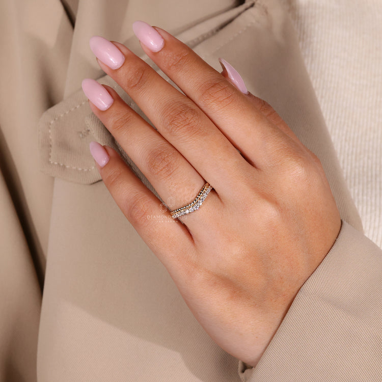 Yellow gold wedding band and milgrain wedding band.
