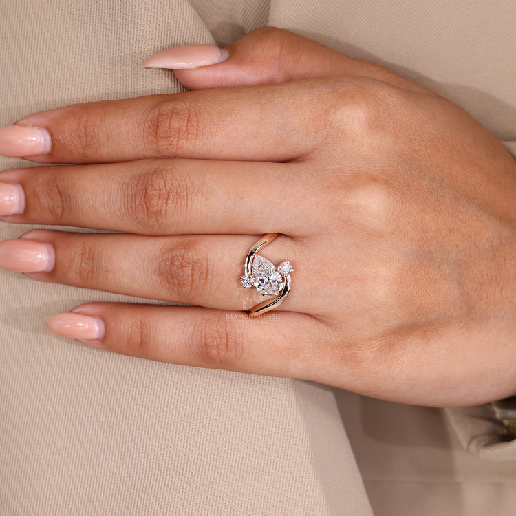 Rose gold pear diamond engagement ring.