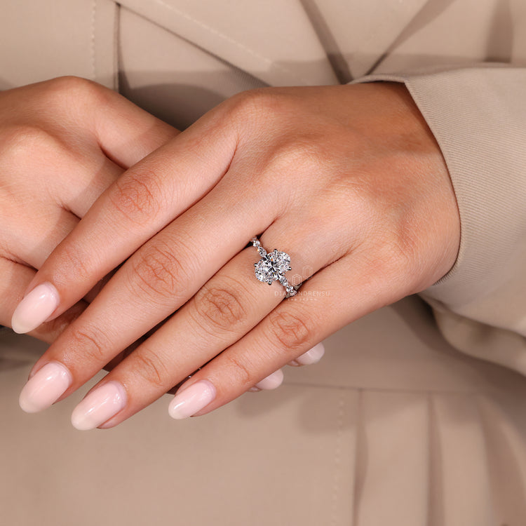 Customise ring using shared prong setting.