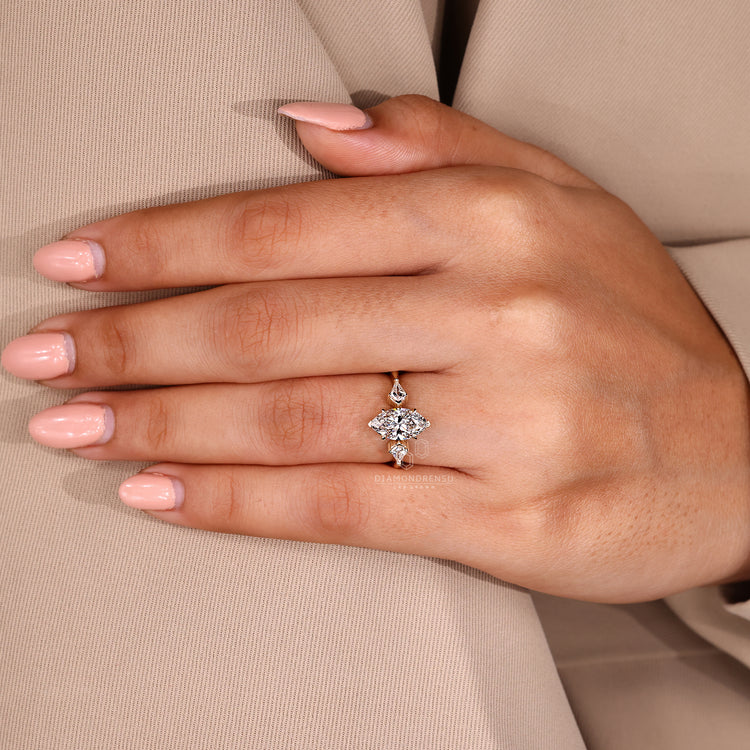 Three stone diamond ring with tapered shank.