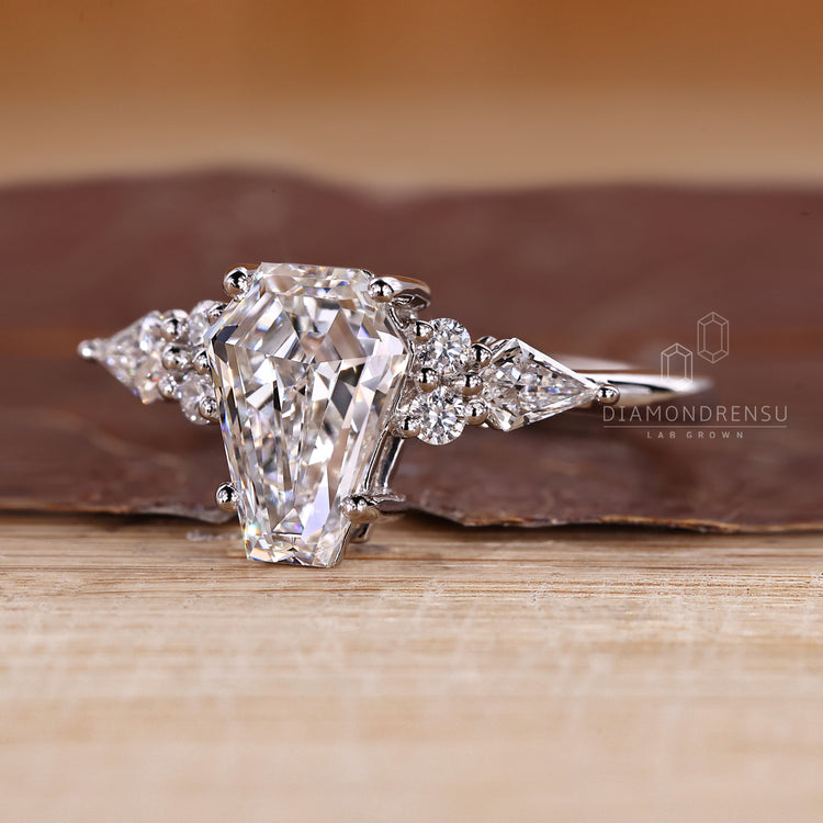 Coffin Ring - A Stylish Kite Cut with Round Stones.