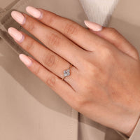 Oval cut diamond ring with four prong setting.