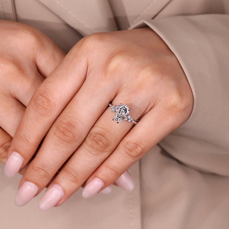 Coffin cut ring prong setting cluster design.