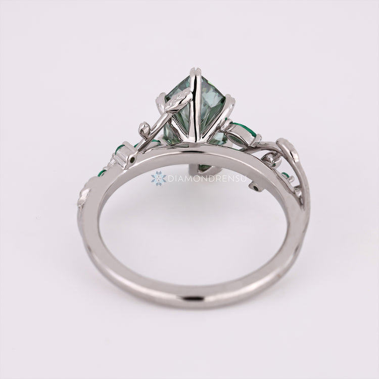 Dutch marquise diamond ring with six leaf style prongs.