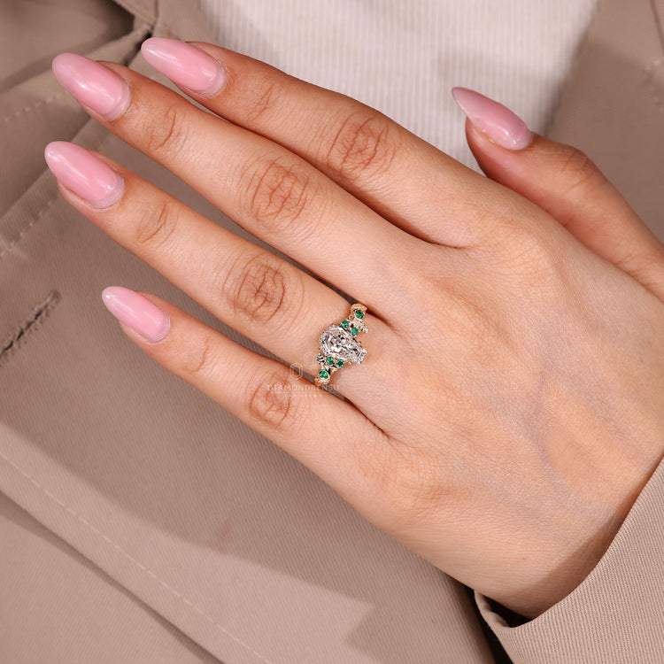 Coffin diamond ring green side stones style.
