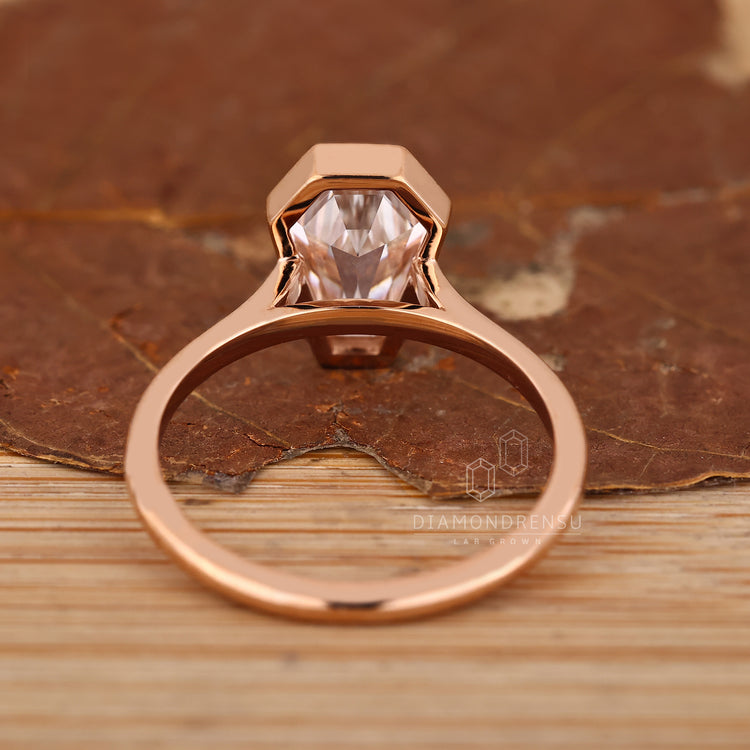 IGI certified coffin diamond ring bezel setting.