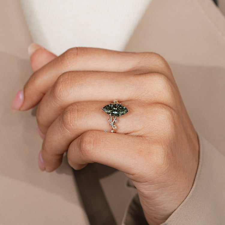 Marquise diamond ring with tulip basket setting.