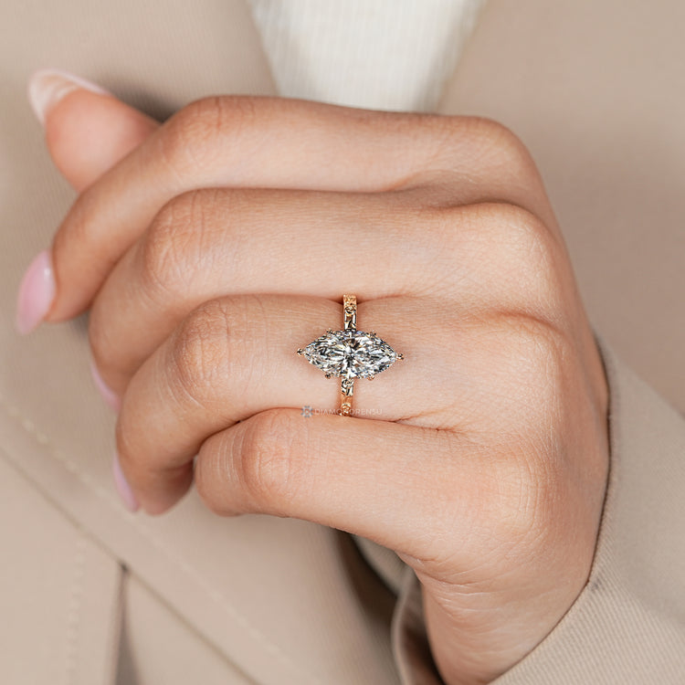 Lab grown marquise diamond ring with flower shank.