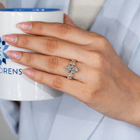 Marquise diamond ring with six claw prong setting.