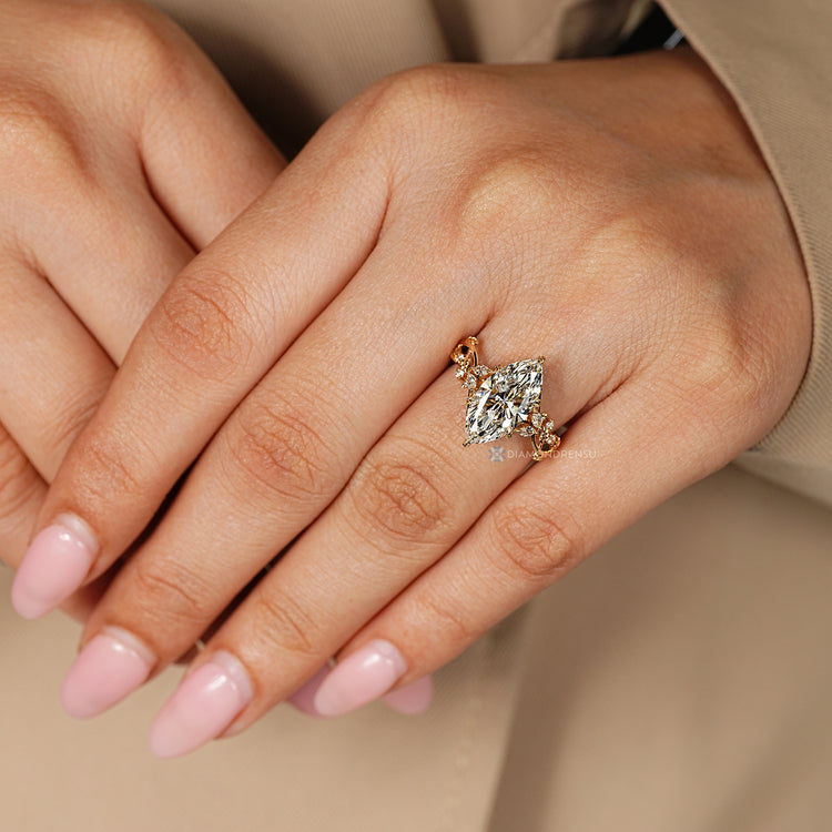 Handmade marquise diamond ring with tulip basket.