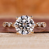 Round engagement ring with 4 prong setting.