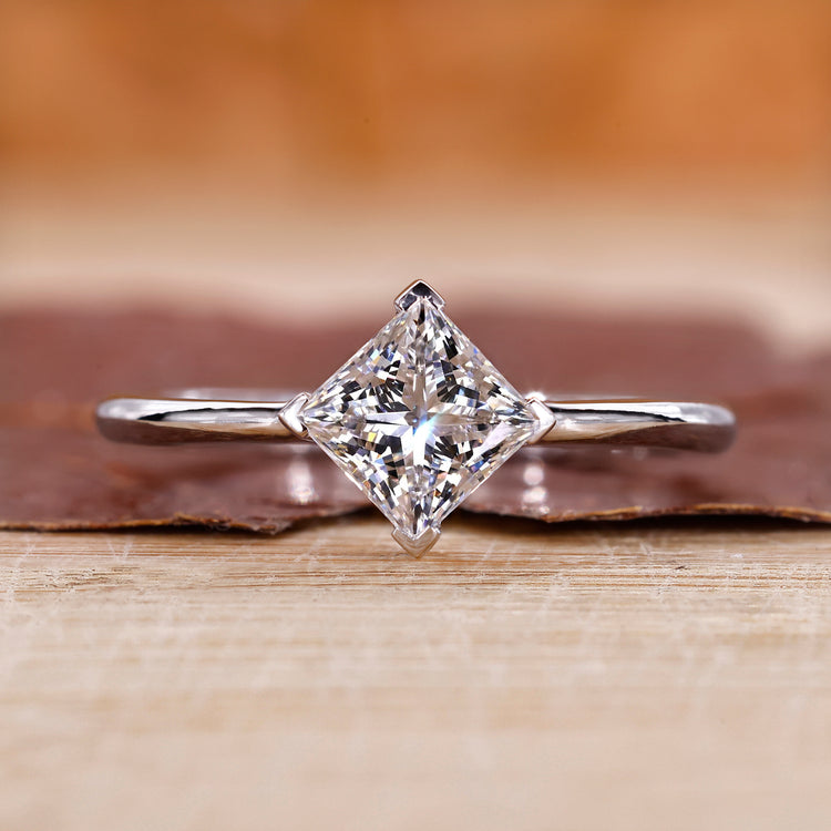 Princess cut engagement ring and solitaire engagement ring.