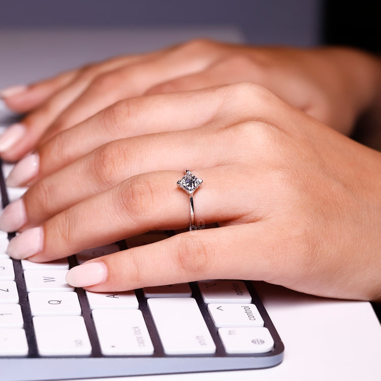White gold engagement ring and simple ring.
