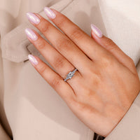 White gold ring with 4 prong setting.