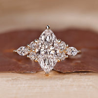 Marquise diamond ring with seven stone design.