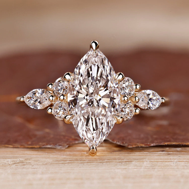 Marquise diamond ring with seven stone design.