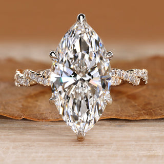 Marquise diamond ring with tulip basket setting.