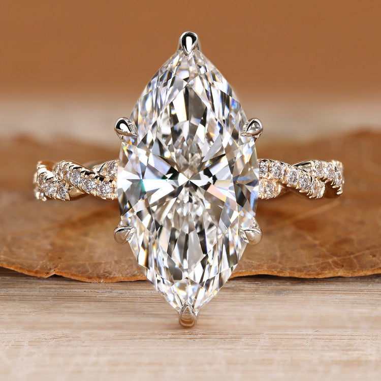 Marquise diamond ring with tulip basket setting.