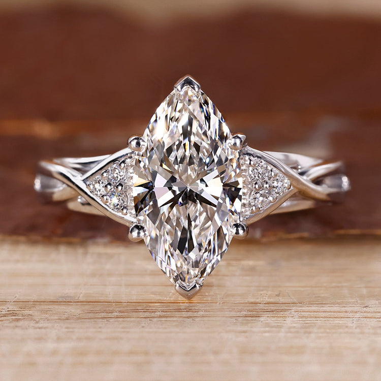 Seven stone diamond ring with marquise diamond centre.
