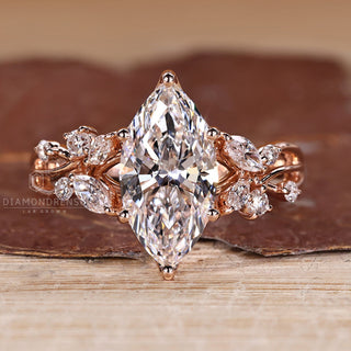 Marquise diamond ring cluster nature inspired style.