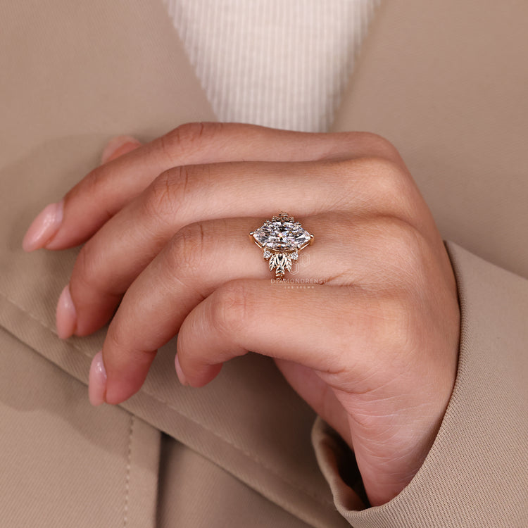 Marquise cut diamond ring in five stone style.