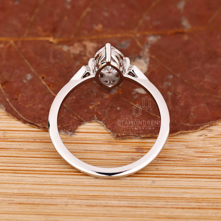 IGI certified marquise diamond ring compass prong.