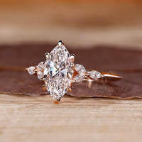 Seven stone marquise diamond ring knife edge shank.