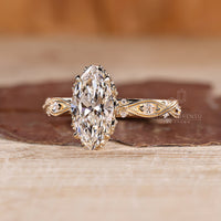 Art deco marquise diamond ring milgrain setting.