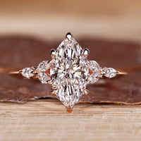 Marquise cut diamond ring seven stone muse setting.