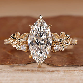 Marquise diamond ring pave round diamond nature style.