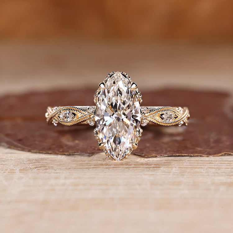 Marquise cut diamond ring vintage art deco milgrain.
