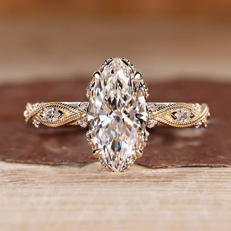 Marquise cut diamond ring vintage art deco milgrain.