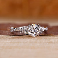 Wave shank round diamond ring elegant style.