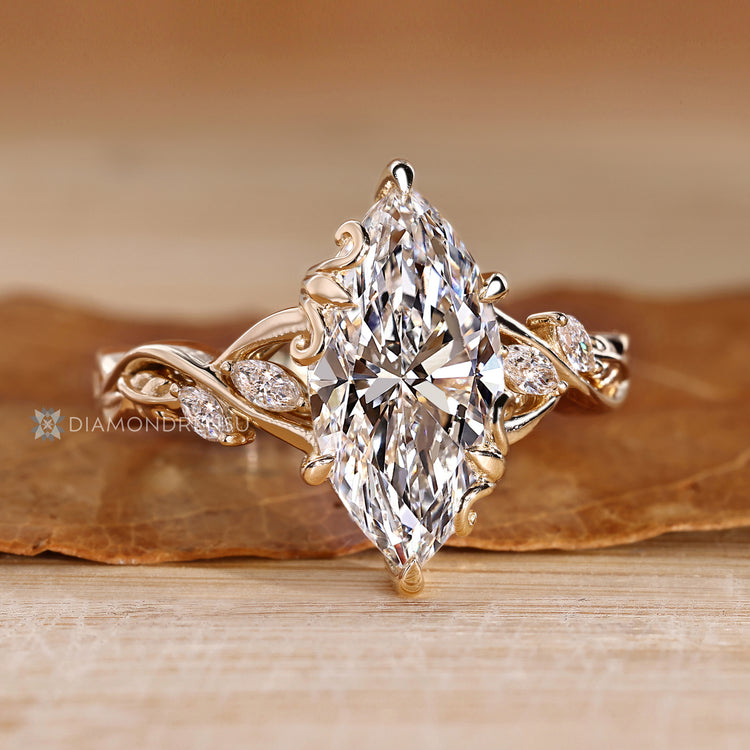 Marquise cut ring with nature inspired design.