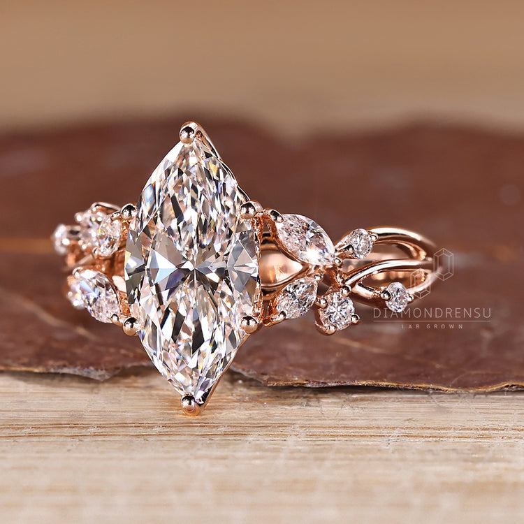 Lab grown marquise diamond ring cluster style.