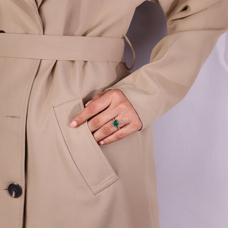 Asscher emerald ring art deco cathedral setting.