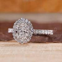 Diamondrensu AU handmade elongated cushion cut diamond ring.
