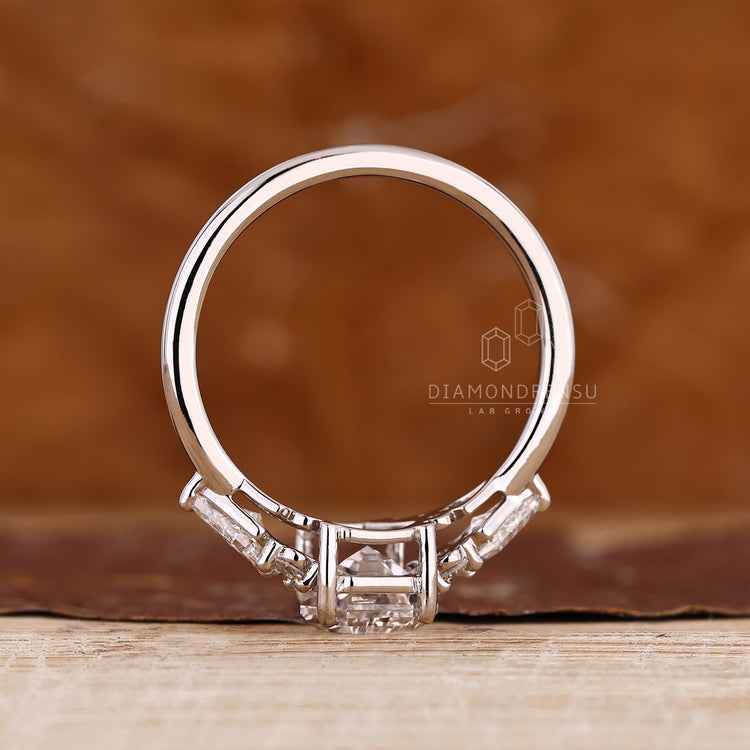 An IGI Certified Coffin Diamond Ring with a Tapered Shank.