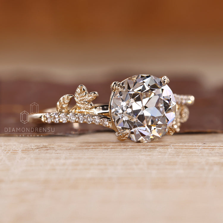 IGI certified round old cut ring cathedral setting.