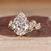 Pear Cut Diamond Engagement Ring six claw prong.
