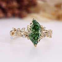 Dutch marquise diamond ring with cluster setting.
