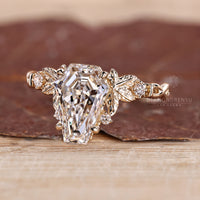 Coffin cut ring claw prong setting design.
