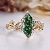 Nature inspired marquise ring with flower bud prongs.