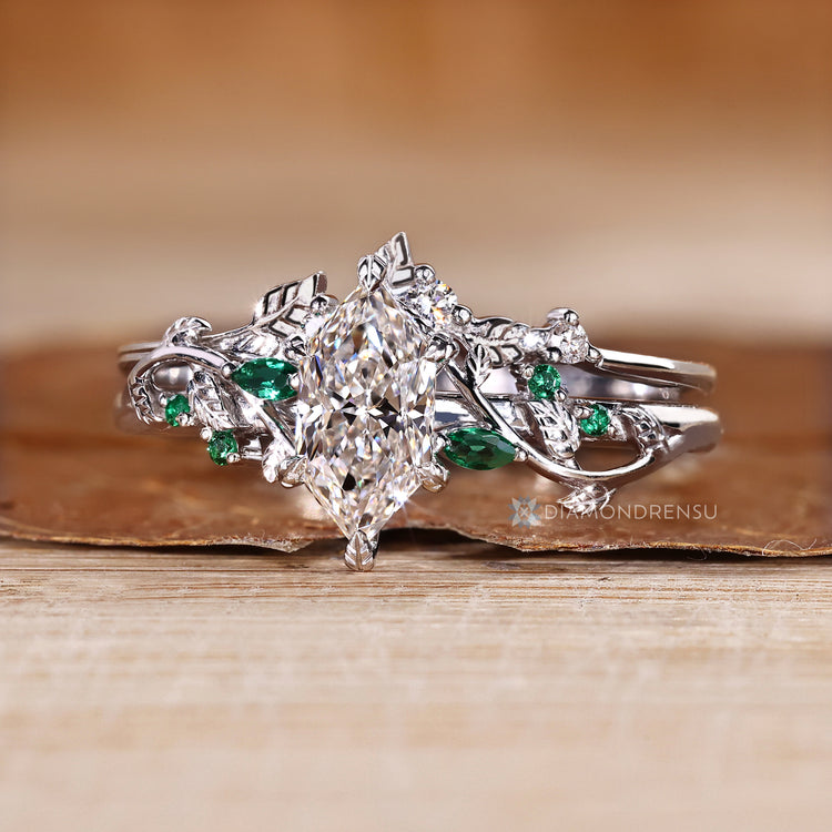 Dutch marquise bridal set with nature inspired wedding band.