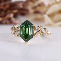 Lab grown hexagon diamond ring with green diamond.