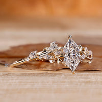 Dutch marquise bridal set with round diamond band.